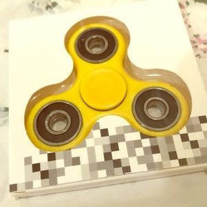 Yellow fidget spinner